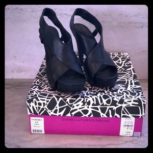 Black high heeled sandals